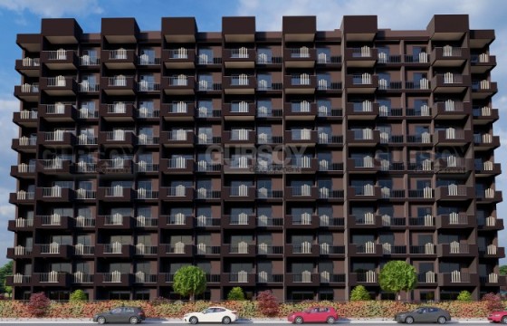 Новый инвестиционный проект в курортном районе Мерсина Чешмели - 10-этажный жилой комплекс в 1200 метрах от моря в Турции - фото 1