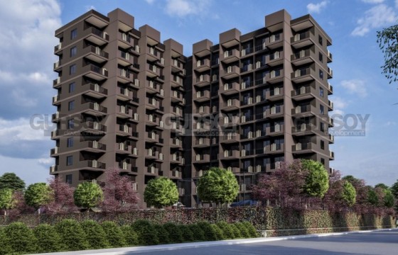 Апартаменты в 10-этажном жилом комплексе на этапе строительства в 300 метрах от моря, в центре района Чешмели в Турции - фото 5