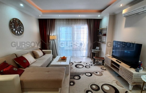 Продажа двухкомнатной квартиры с мебелью в Махмутларе в Турции - фото 5