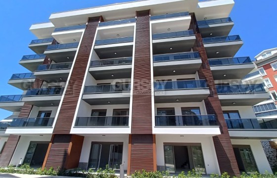 Новая двухкомнатная квартира в районе Тосмур в Турции - фото 2