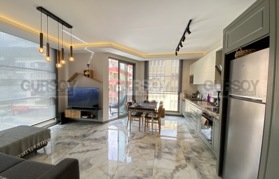 Стильная квартира планировки 2+1 в центре Алании в Турции - фото 2