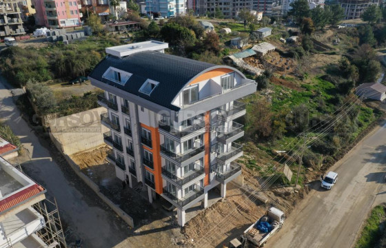 Квартиры от застройщика в готовом комплексе в Авсалларе, 54 м2-105 м2 в Турции - фото 1