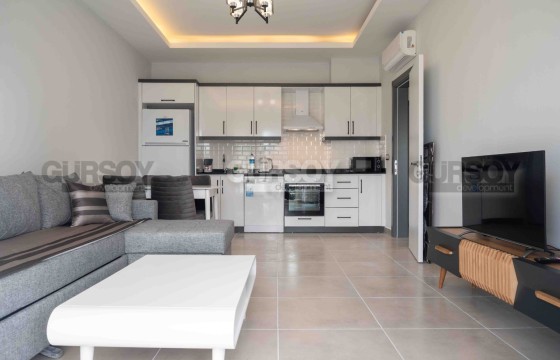 Уютная двухкомнатная меблированная квартира в районе Махмутлар в Турции - фото 5