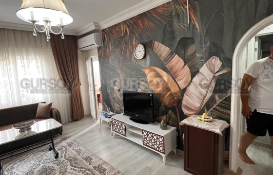 Двухкомнатная меблированная квартира близко к морю в Турции - фото 4