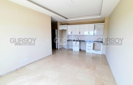 Просторные двухкомнатные апартаменты в районе Каргыджак в Турции - фото 5