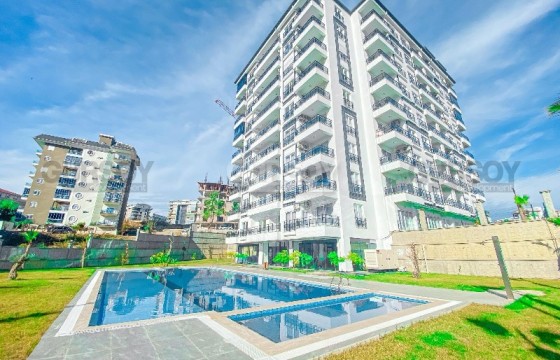 Современная квартира 1+1 в новом комплексе в районе Авсаллар в Турции - фото 2