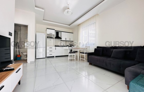 Уютные двухкомнатные апартаменты в районе Махмутлар в Турции - фото 4