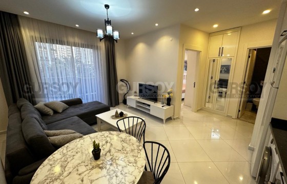 Меблированные двухкомнатные апартаменты в популярном комплексе отельного типа, район Махмутлар в Турции - фото 5