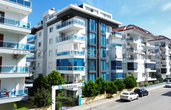 Двухуровневая квартира в 100 метрах от моря, подходящая для гражданства Турции в Турции - фото 1