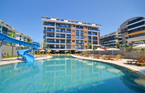 Квартира 1+1 с мебелью и техникой в 200 метрах от моря в Турции - фото 4