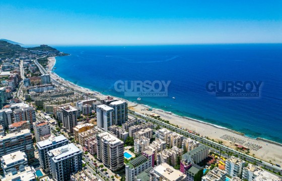 Трехкомнатная квартира на первой береговой линии в Махмутларе в Турции - фото 2