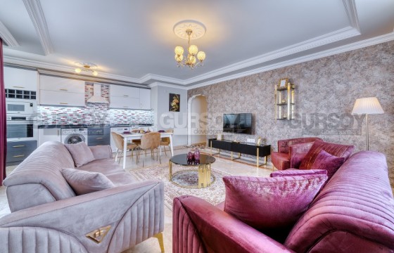 Четырехкомнатные апартаменты с шикарным ремонтом в районе Махмутлар в Турции - фото 1