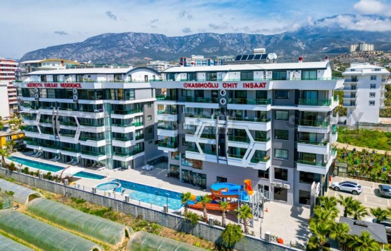 Стильные апартаменты 2+1 в районе Каргыджак в Турции - фото 4