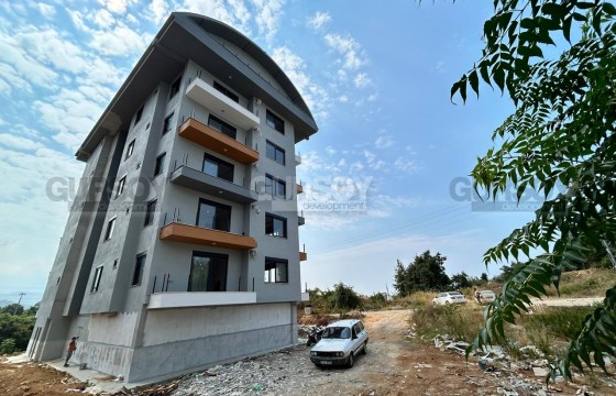 Уютная квартира 1+1 в строящемся комплексе в живописном районе Алании в Турции - фото 5