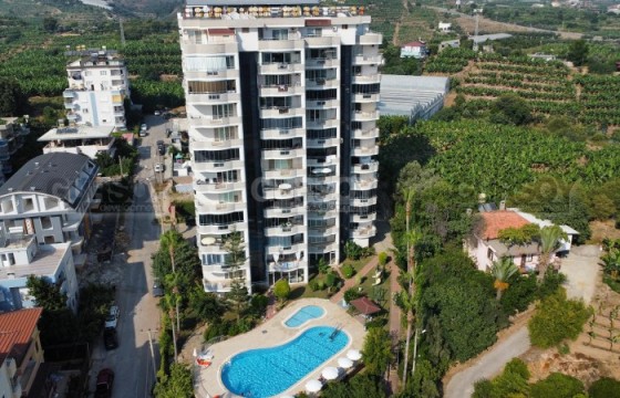 Уютные меблированные апартаменты планировки 2+1 в Махмутларе в Турции - фото 1