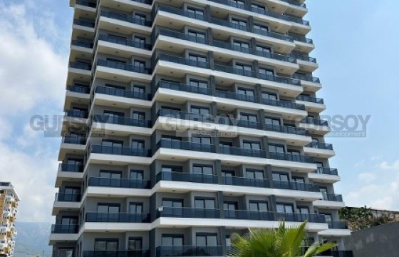 Отличная двухкомнатная квартира в районе Махмутлар в новом комплексе в Турции - фото 4