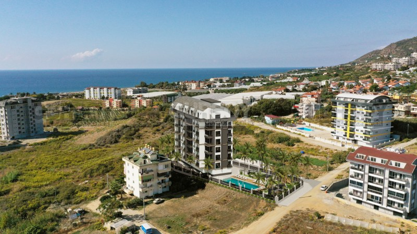 Инвестиционный проект в районе Демирташ. Всего 500м до моря. в Турции - фото 1
