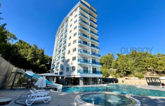 Квартира с одной спальной комнатой в комплексе с инфраструктурой район Авсаллар в Турции - фото 12