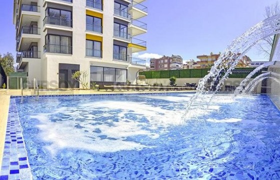 Квартира с двумя спальнями в 150 метрах от пляжа с частичным видом на море в Турции - фото 2