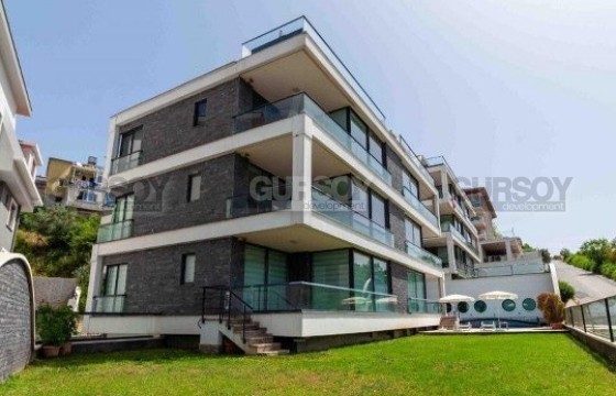 Квартира 2+1 с шикарными панорамными видами на город и море, с выходом в сад, подходящая под ВНЖ в Турции - фото 9