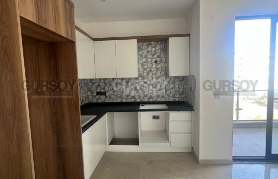 Отличная квартира в планировке 1+1 в районе Демирташ недалеко от моря в Турции - фото 8