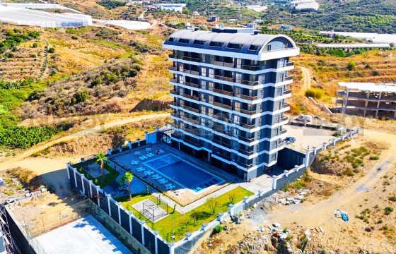 Бюджетная квартира 1+1 в новом комплексе с полной инфраструктурой в районе Демирташ в Турции - фото 6