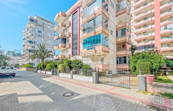 Квартира 1+1 с большой площадью от моря 300 метров в районе Махмутлар в Турции - фото 5