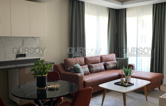 Меблированная квартира 1+1 в престижном комплексе в районе знаменитого пляжа Клеопатра в Турции - фото 2