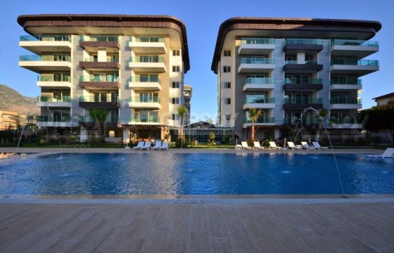 Меблированная квартира на первой береговой линии с видом на море в комплексе с инфраструктурой в Турции - фото 2