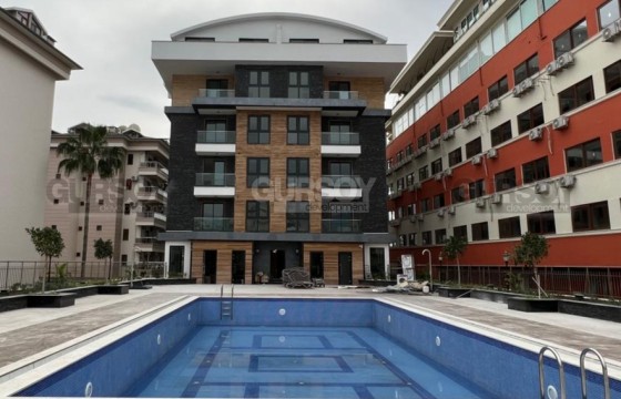 Стильная меблированная квартира 1+1 на первой береговой линии с видом на море в популярном районе Оба в Турции - фото 10