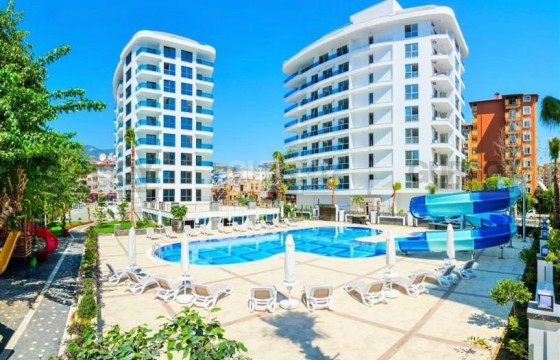 Квартира с одной спальней в центре Алании в комплексе с инфраструктурой в Турции - фото 5