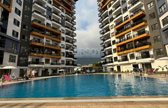 Современная квартира у моря с отличной инфраструктурой в Турции - фото 2