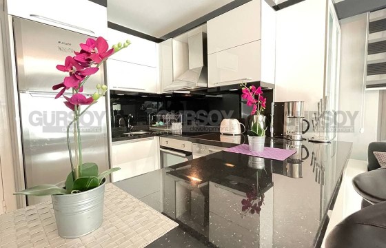 Меблированная квартира с двумя спальнями в 50 метрах от моря в престижном районе Оба в Турции - фото 5