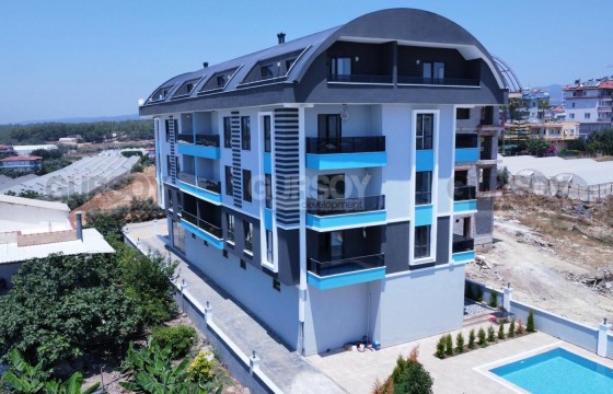 Недорогая квартира на средиземном море в новом комплексе в живописном районе в Турции - фото 1