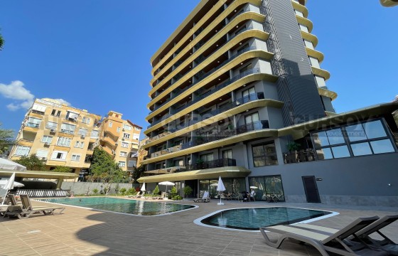 Большая двухкомнатная квартира в популярном комплексе в отличной локации в Турции - фото 1