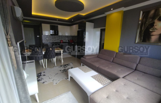 Стильная квартира 1+1, 55м2 в районе Махмутлар. До моря 400м. в Турции - фото 1