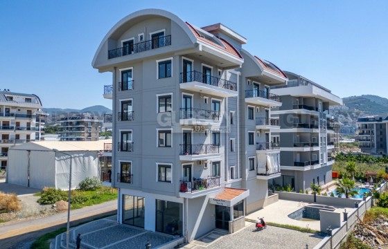 Квартира 1+1 в районе Каргыджак, всего в 300 метрах от моря в Турции - фото 4