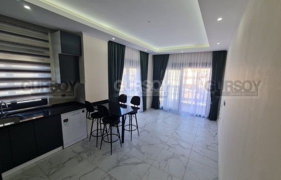 Современная квартира 1+1 в самом центре Алании в Турции - фото 2