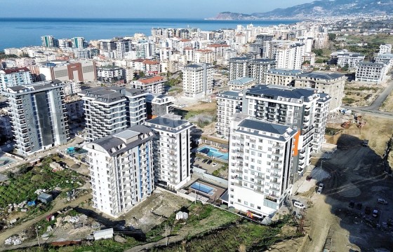 1+1 в новом жилом комплексе в районе Махмутлар в Турции - фото 4