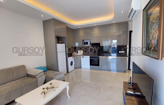 Квартира 1+1 в новом комплексе премиум класса всего в 400 метрах от моря в Турции - фото 4