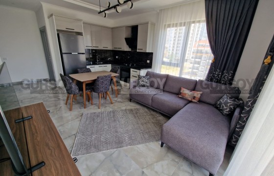 Современная квартира 1+1 с инфраструктурой, всего в 300 метрах от моря в Турции - фото 5