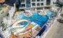 kvartira-1-1-v-novom-komplekse-v-centre-alani-i-vsego-800-metrakh-ot-morya в Турции - фото 2