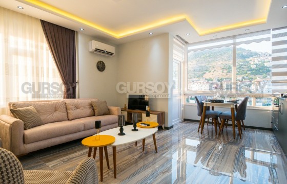 Квартира 1+1 в центре Алании с видом на море и горы в Турции - фото 7