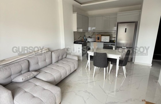 Квартира 1+1  в новом комплексе в Каргыджаке в 300 метрах от моря в Турции - фото 2