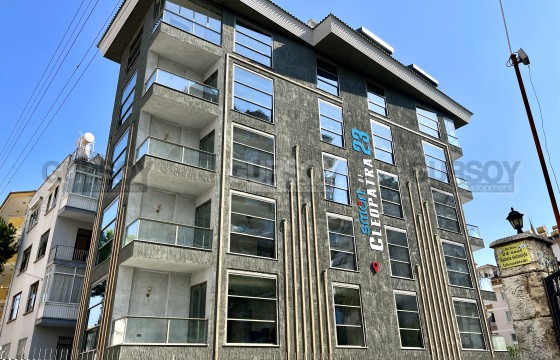 Современная квартира 2+1 с панорамными окнами в центре Алании в Турции - фото 1