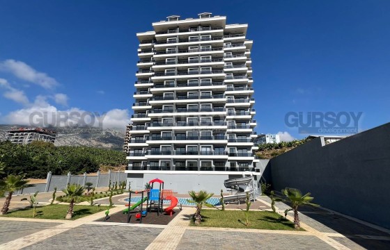 Современная квартира 1+1 с видом на море в Махмутларе в Турции - фото 6