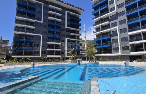 Недорогая квартира в новом жилом комплексе известного застройщика в Турции - фото 1