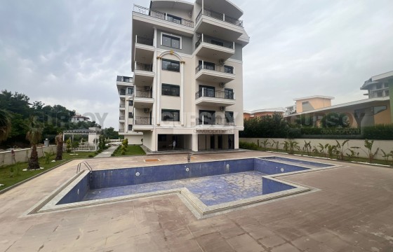 Квартира 1+1 с полной инфраструктурой в районе Оба по выгодной цене в Турции - фото 1