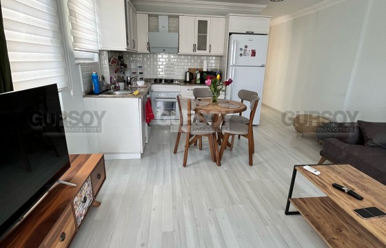 Квартира 1+1 с видом на Кале в районе пляжа Клеопатра в Турции - фото 1