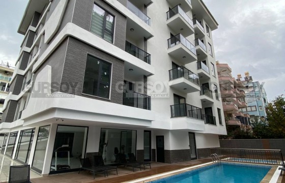 Квартира 1+1 с мебелью в новом доме всего в 100 метрах от моря в Турции - фото 12